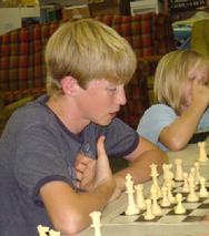 Student studies position at Karpov Chess School